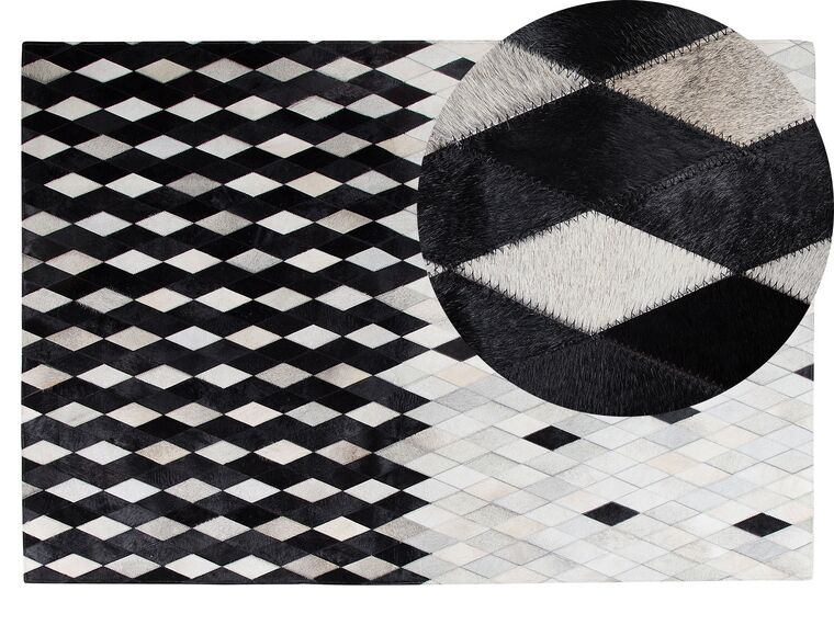 Kožený koberec 140 x 200 cm biela/čierna/béžová MALDAN_742847