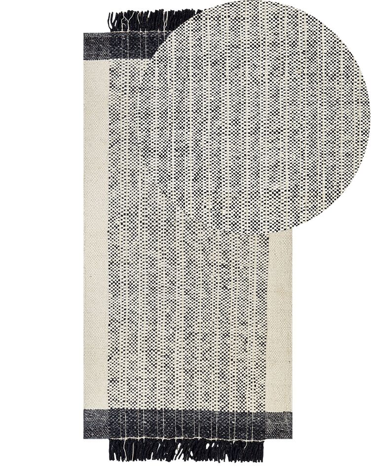 Fekete és fehér gyapjúszőnyeg 80 x 150 cm KETENLI_847438