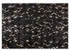 Černo-zlatý kožený koberec 140x200 cm DEVELI_850969