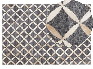 Kožený koberec 140 x 200 cm sivá/béžová GENC
