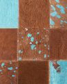Alfombra de piel de vaca marrón dorado/azul turquesa 160 x 230 cm ALIAGA_493079