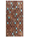 Alfombra de piel de vaca marrón dorado/azul turquesa 80 x 150 cm ALIAGA_641394