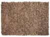 Kožený koberec 140 x 200 cm béžový MUT_848611