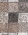 Kožený koberec 140 x 200 cm sivá/hnedá/béžová ARMUTLU_780672