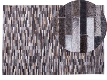 Kožený koberec 140 x 200 cm sivá/hnedá AHILLI