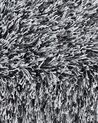 Fekete és fehér hosszú szálú szőnyeg 140 x 200 cm CIDE_746807