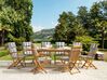 Trädgårdsmöbelset av bord och 8 stolar med dynor i blå/beige MAUI_743946