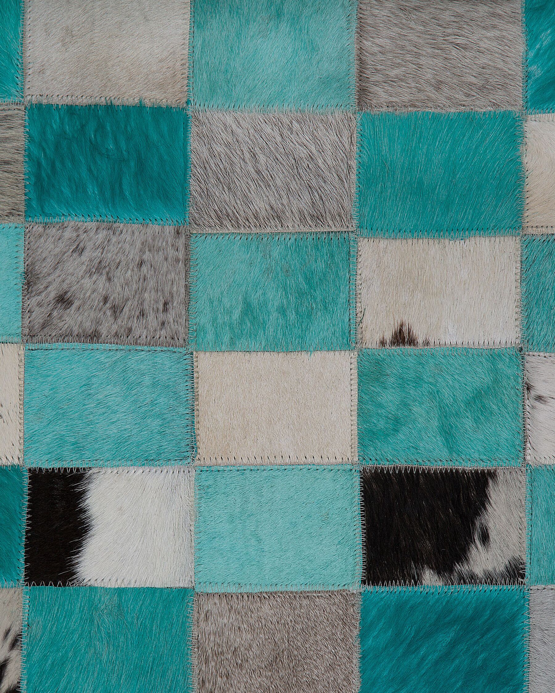 Cowhide Area Rug Turquoise and Grey 140 x 200 cm NIKFER Beliani.co.uk