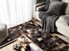 Hnědozlatý patchwork kožený koberec 140x200 cm BANDIRMA_558511