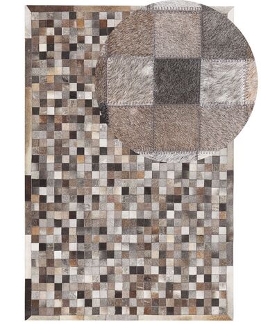 Kožený koberec 140 x 200 cm sivá/hnedá/béžová ARMUTLU