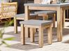 Set de jardin 8 places table avec 2 bancs et 2 tabourets gris en fibre-ciment et bois OSTUNI_804900
