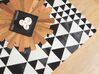 Teppich Kuhfell schwarz-weiß 140 x 200 cm geometrisches Muster ODEMIS_689618