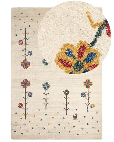 Dywan wełniany gabbeh ze wzorem w kwiaty 140 x 200 cm beżowy HUSUNLU