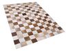 Kožený koberec hnědý s béžovou 140 x 200 cm SOLMAZ_758281