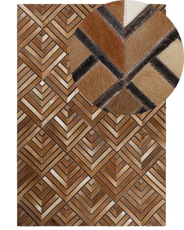 Teppich Kuhfell braun 140 x 200 cm geometrisches Muster Kurzflor TEKIR