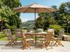 Trädgårdsmöbelset av bord 8 stolar med dynor och parasoll  MAUI_744079