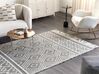 Teppich Wolle schwarz / weiß 160 x 230 cm Fransen Kurzflor SAVUCA_856510