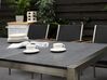 Table de jardin acier inox plateau granit triple noir flambé 220 cm avec 8 chaises en textile noir GROSSETO_768699