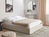 Čalúnená posteľ s úložným priestorom 140 x 200 cm svetlobéžová DINAN_903623
