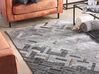 Kožený koberec 140 x 200 cm sivý DARA_782426