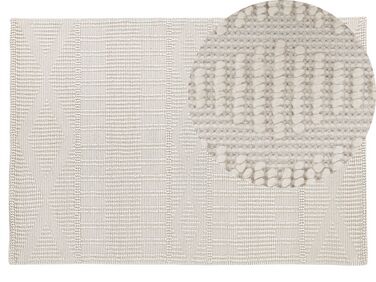 Teppich Wolle helles Beige 140 x 200 cm geometrisches Muster Kurzflor LAPSEKI