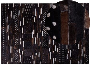 Teppich Kuhfell dunkelbraun 160 x 230 cm geometrisches Muster Kurzflor AKSEKI