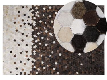 Kožený koberec 140 x 200 cm hnedá/béžová EYIM