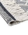 Teppich Wolle schwarz / weiß 160 x 230 cm Fransen Kurzflor SAVUCA_856513