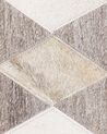 Kožený koberec 140 x 200 cm béžová/hnedá SESLICE_780548