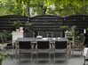 Table de jardin acier inox plateau granit triple noir flambé 220 cm avec 8 chaises en rotin GROSSETO_452632