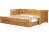Drevená rozkladacia posteľ s úložným priestorom 90/180x200 cm svetlé drevo CAHORS_912564