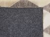Kožený koberec 140 x 200 cm béžová/hnedá SESLICE_780549
