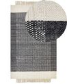 Teppich Wolle schwarz / cremeweiss 140 x 200 cm Streifenmuster Kurzflor ATLANTI_847259
