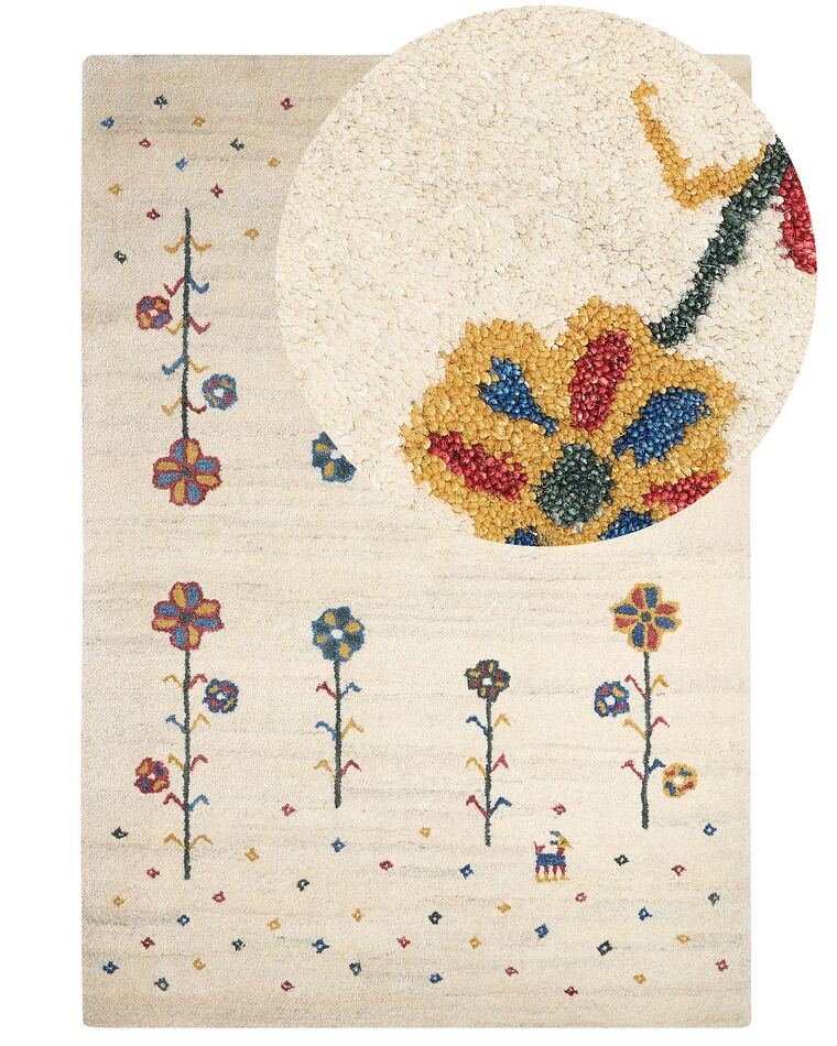 Tapis gabbeh en laine avec motif floral 140 x 200 cm beige HUSUNLU_855490