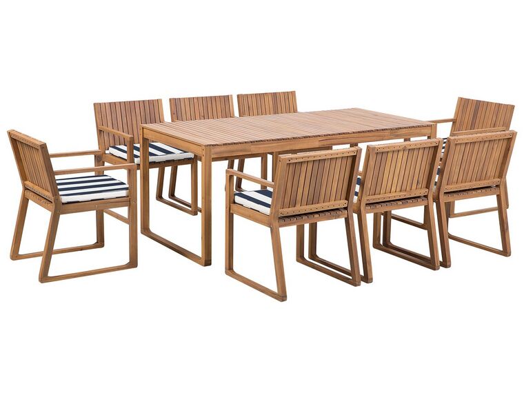 Trädgårdsmöbelset av bord och 8 stolar akaciaträ med dynor i marinblå SASSARI_774922