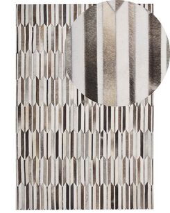 Matto lehmännahka ruskea/beige 140 x 200 cm KULALAR Matto lehmännahka ruskea/beige 140 x 200 cm KULALAR