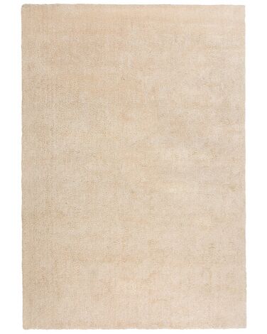 Tappeto shaggy beige chiaro 140 x 200 cm DEMRE