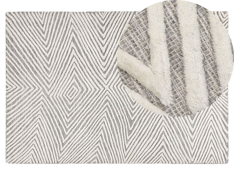 Alfombra de lana gris claro/blanco crema 140 x 200 cm GOKSUN_837851