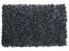 Tappeto shaggy in pelle nera 140 x 200 cm MUT_848776