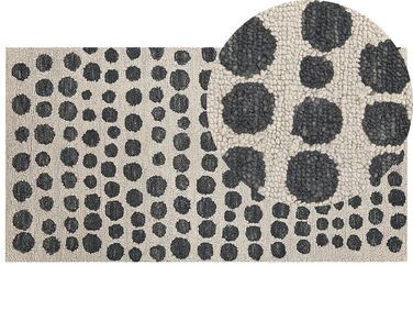 Teppich beige / schwarz 80 x 150 cm gepunktetes Muster HAVRAN