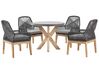 Négyszemélyes kerek beton étkezőasztal fekete székekkel OLBIA_809604