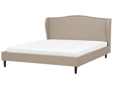 Čalouněná béžová postel 180x200 cm COLMAR