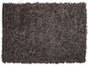 Kožený shaggy koberec 140 x 200 cm hnědý MUT_848615