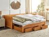 Drevená rozkladacia posteľ s úložným priestorom 90/180x200 cm svetlé drevo CAHORS_912560