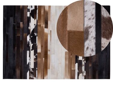 Kožený koberec 140 x 200 cm čierna/béžová DALYAN