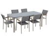 Hatszemélyes étkezőasztal fekete üveglappal és szürke textilén székekkel GROSSETO_677257