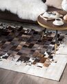 Kožený koberec 140 x 200 cm hnedá/béžová OKCULU_743062