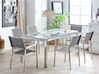 Hatszemélyes étkezőasztal üveglappal és szürke textilén székekkel GROSSETO_764033