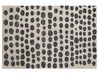 Teppich beige / schwarz 140 x 200 cm gepunktetes Muster HAVRAN_836375