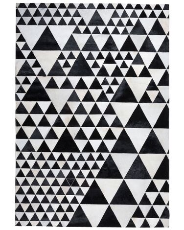 Teppich Kuhfell schwarz-weiss 140 x 200 cm geometrisches Muster Kurzflor ODEMIS